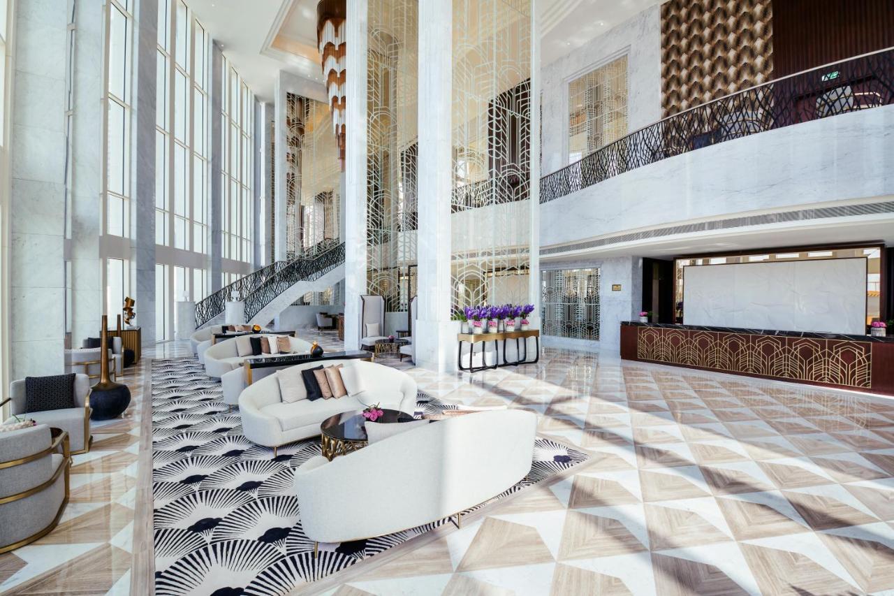 Wyndham Grand Doha West Bay Beach Bagian luar foto The lobby of the hotel