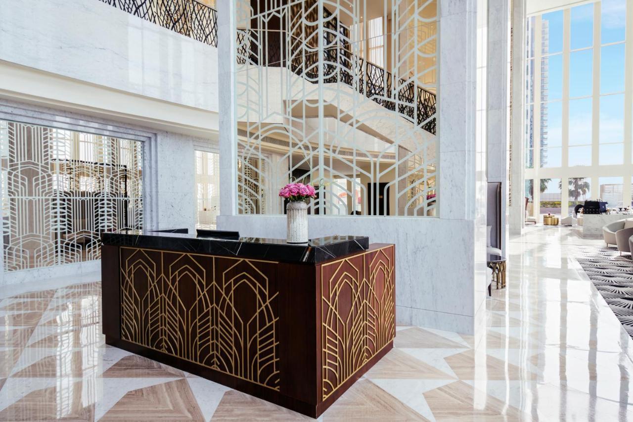 Wyndham Grand Doha West Bay Beach Bagian luar foto The lobby of the hotel