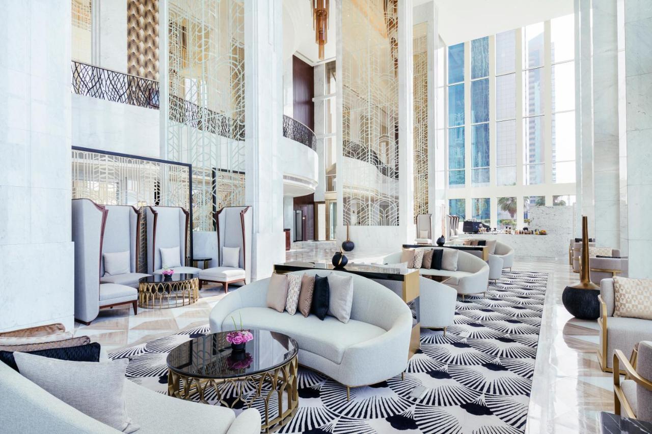 Wyndham Grand Doha West Bay Beach Bagian luar foto The lobby of the hotel