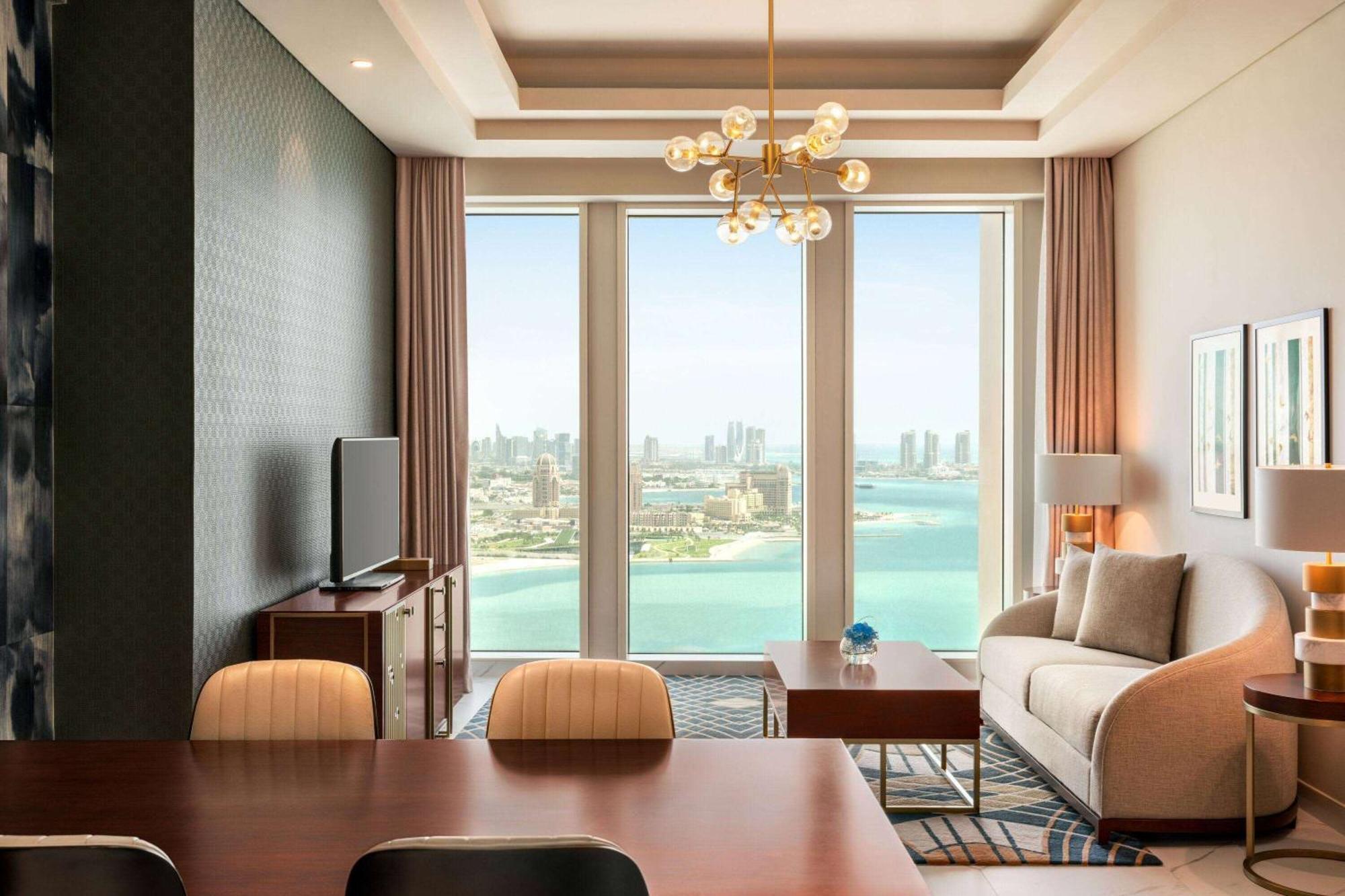 Wyndham Grand Doha West Bay Beach Bagian luar foto A living room at the hotel