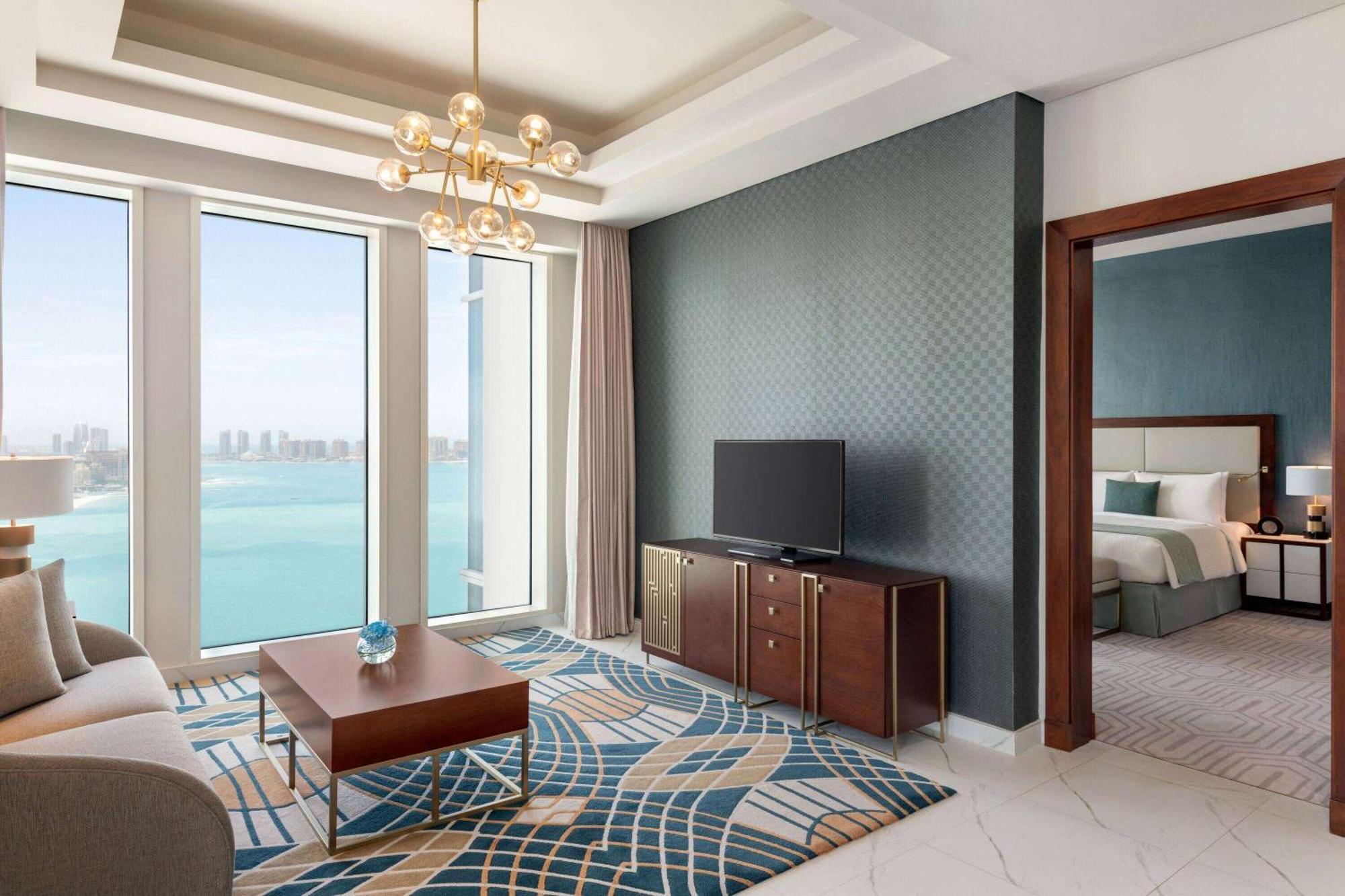 Wyndham Grand Doha West Bay Beach Bagian luar foto A suite at the hotel